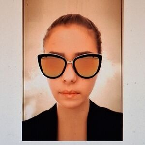 Foster Grant Black Cat-Eye Sunglasses with Mirrored Lenses compared to Quay